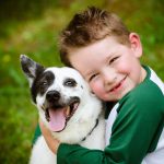 child and pet dog